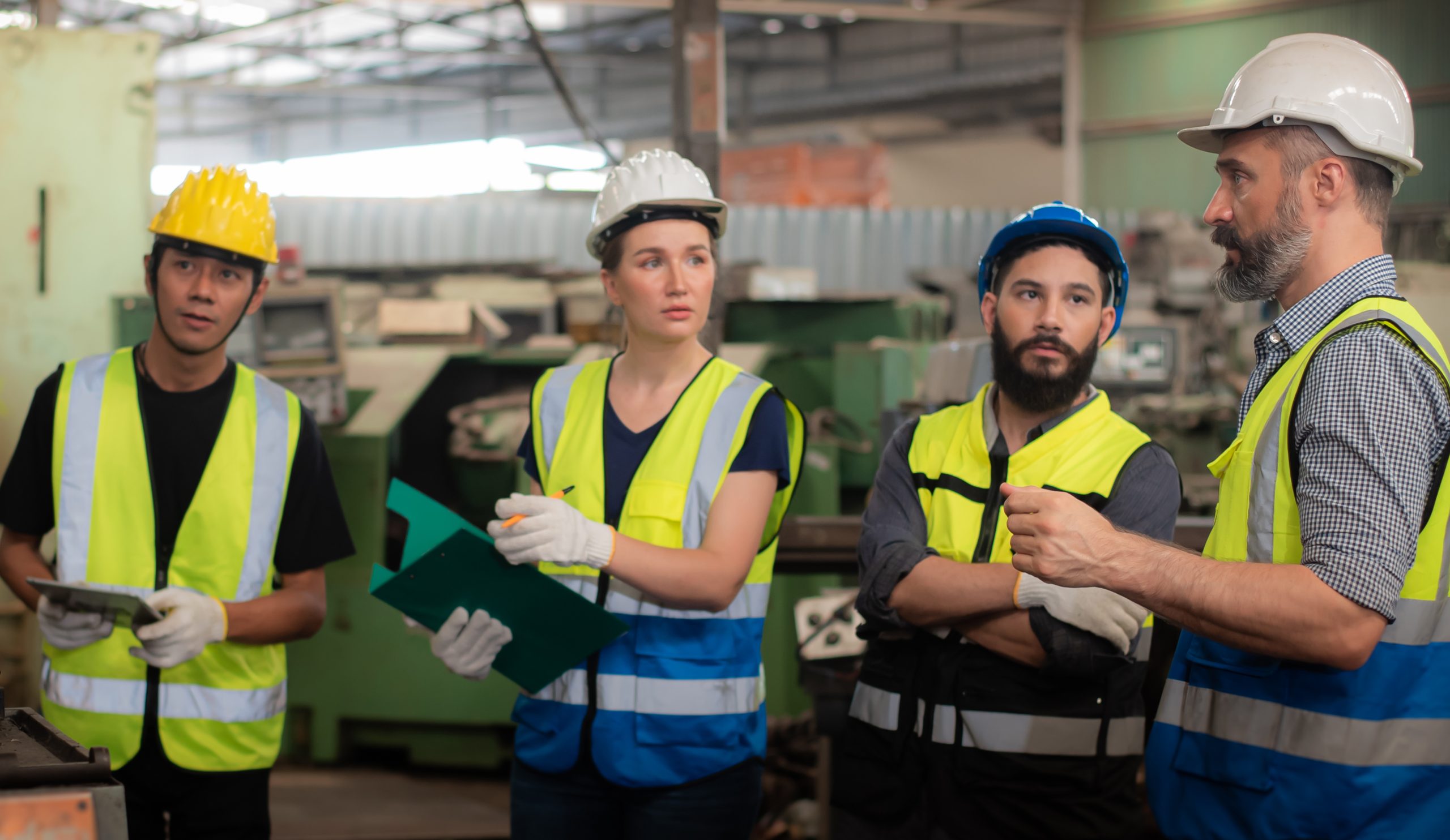 Professional Caucasian manager engineer in safety uniform is tra